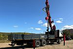 Бортовой автомобиль FAW с КМУ UMM 816 ТБ с буровой установкой